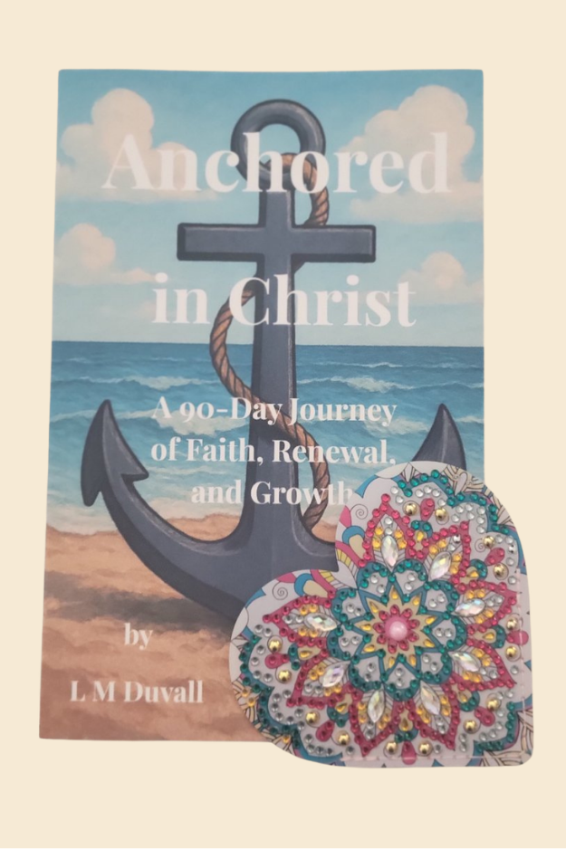 Colorful heart corner bookmark placed at bottom corner of Anchored in Christ book