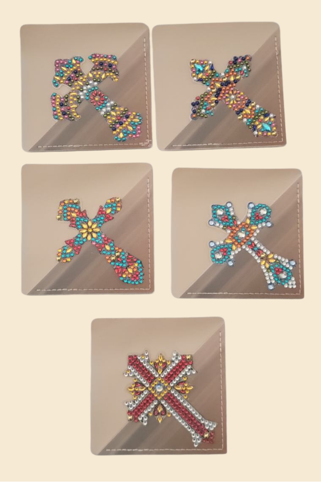 Colorful cross corner bookmarks with decorative designs on neutral background