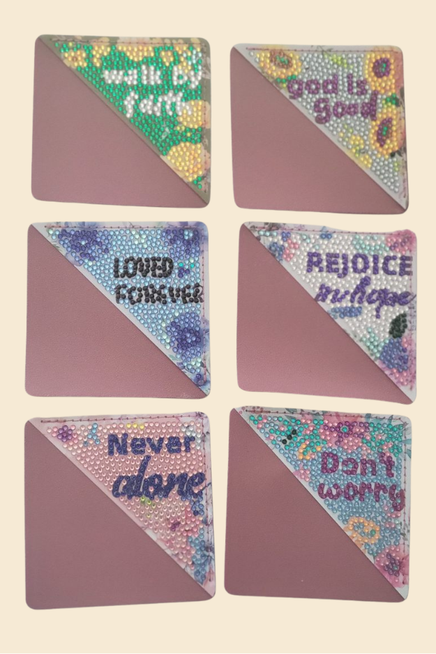 Colorful encouraging corner bookmarks with decorative designs on neutral background