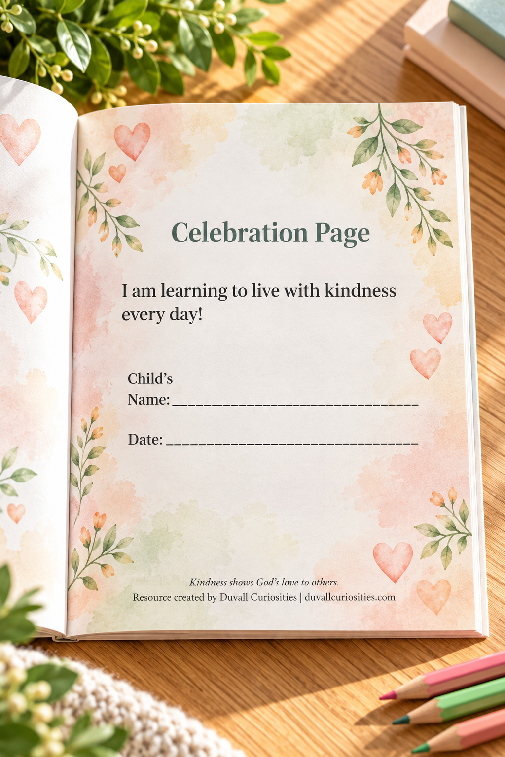 Open paperback of Small Acts. Big Love., a 4-week children’s Christian devotional by L. M. Duvall, displaying the Celebration Page with space for a child’s name and date, surrounded by watercolor hearts, greenery, and colored pencils on a light oak tabletop.