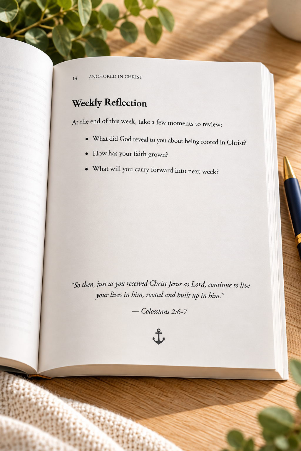 Open paperback of Anchored in Christ: A 90-Day Journey of Faith, Renewal, and Growth by L. M. Duvall, displaying the Weekly Reflection page with three faith-based questions, Colossians 2:6–7, and a small anchor illustration. The devotional rests on a light wooden tabletop with soft natural lighting, greenery, and a pen.