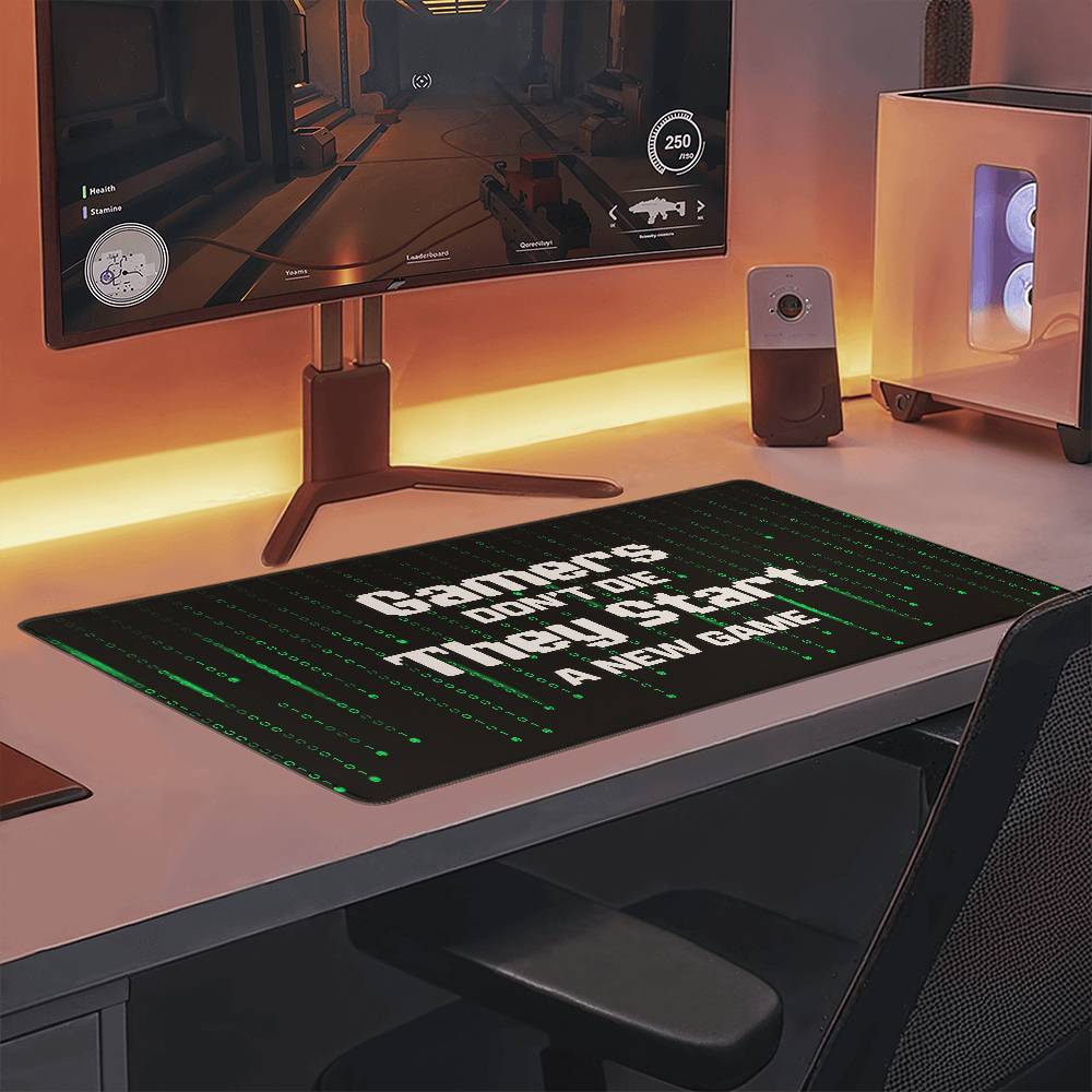 Gamers Don't Die They Start a New Game Gaming Desk Mat (white text)